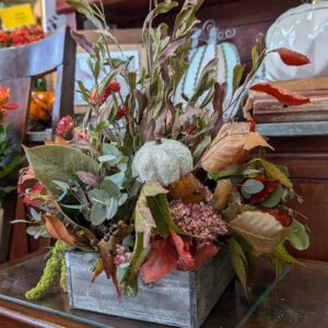 Stewart-Baxter-Funerals- Rustic fall mix of flowers