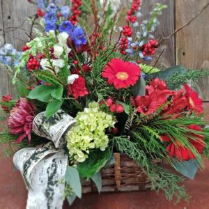 Stewart-Baxter-Funerals- Winter mix of flowers in a basket